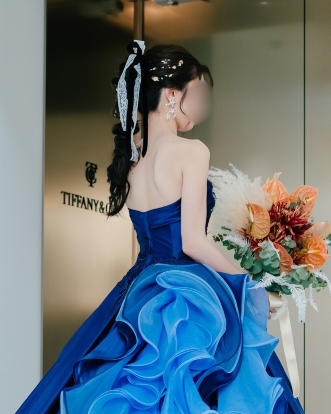 サポートを受けた花嫁の結婚式当日のドレス姿